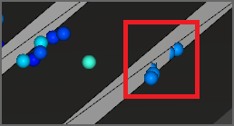 Example showing simulated Sphere particles going through a geometry wall